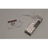 A Dunhill textured silver plated pocket cigarette lighter