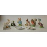 A collection of four Beswick Beatrix Potter figures, comprising Jemima Puddleduck with brown F Warne