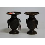 A pair of modern Chinese bronze vases, of baluster form, relief decorated with a dancing figure,