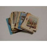 A small collection of assorted 19th century and later greetings cards and postcards etc