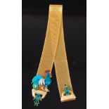 An early 20th century French yellow metal meshlink bookmark, the end having applied enamelled and