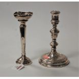 A George V silver table candlestick, having knopped stem to a circular footrim and loaded base, h.