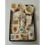 A collection of Goss crested cabinet china, to include model of a Maltese carafe, model of Old