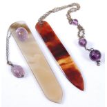 A 19th century bookmark, having agate tapering blade surmounted with an amethyst carved as a