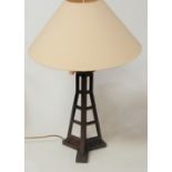 A modern iron burnished table lamp, in the form of a pylon, with shade, h.55cm