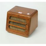 A 1950s oak cased speaker with brass grille, w.24cm