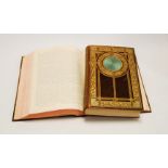 A collection of 19th century and later leather bound books, to include The Complete Works of