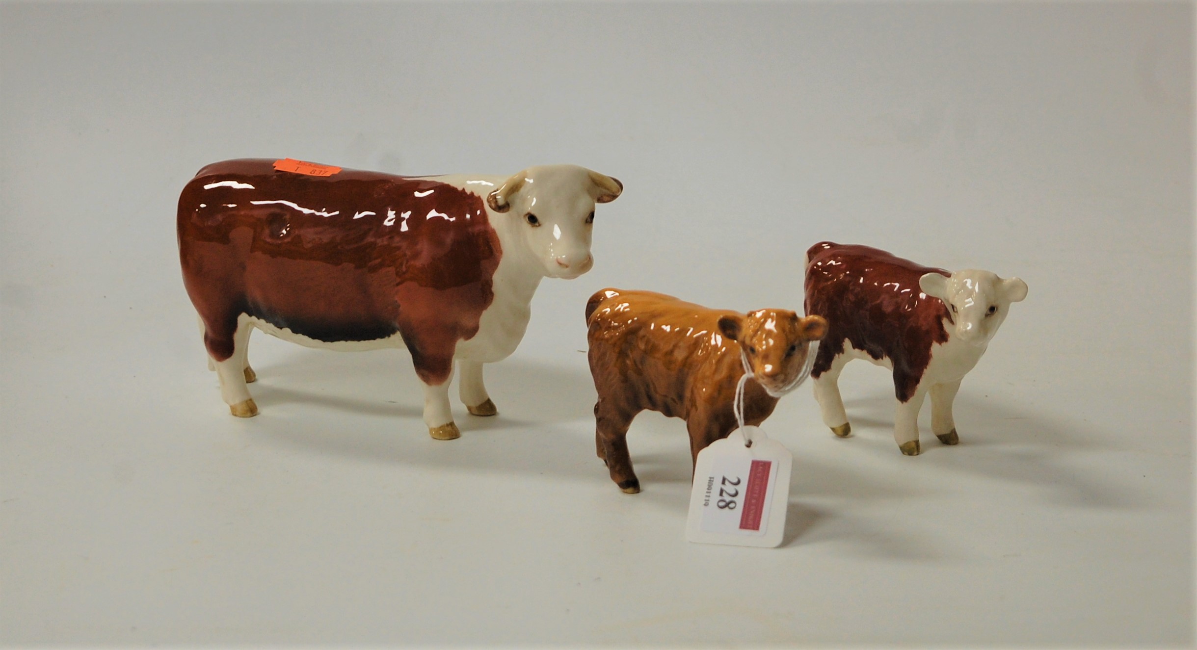 A Beswick model of a Hereford Bull 'Champion of Champions', No.1363; together with a Beswick