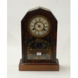 A late 19th century American mahogany cased wall clock having a painted dial with Roman numerals and