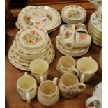 A collection of Royal Doulton Bunnykins table wares to include teacups and saucers, tureen, etc