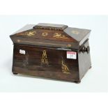 A Regency rosewood and cut brass inlaid tea caddy, of sarcophagus form (lacking interior), w.25cm