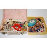 A large collection of costume jewellery, to include bead necklaces, brooches, bracelets etc