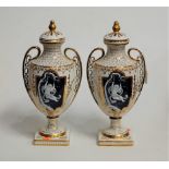 A pair of modern twin handled vases and covers, each of baluster form, each panel having pâte-sur-