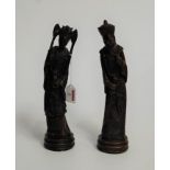 A pair of Asian resin figures, in the form of a male and female sage, h.32cm