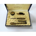 A faux tortoiseshell five-piece lady's manicure set, in fitted felt box, The Tortoiseshell by Yomato