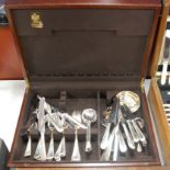 A mahogany canteen of loose silver plated cutlery