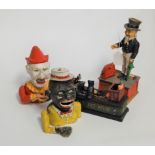 A novelty cast iron cat & mouse moneybox together with three other novelty moneyboxes (4)
