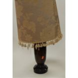 A turned oak table lamp base with floral silk shade, height 70cm including shade