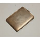 A George V silver pocket cigarette case, having all-over engine turned decoration, 4.8oz