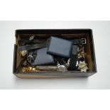 A box of miscellaneous items to include various gents wristwatches, Kings School Ely cap badge,