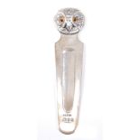 A George V silver novelty bookmark, of plain tapering form, the terminal in the form of an owl's