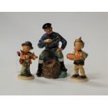A Royal Doulton figure 'The Lobsterman', HN2317; together with two Hummel figures of musicians (3)