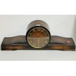 A 1950s beech cased mantel clock, the brass chapter ring with Roman numerals, having eight day