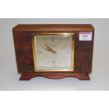 A 20th century Elliott burr walnut mantel clock, retailed by Garrard & Co