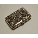 A circa 1900 Chinese white metal pocket cigarette case, of hinged rectangular form, the cover relief