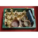 A box of miscellaneous metalware to include a pair of 19th century turned brass candlesticks,