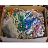 A box of mainly modern costume jewellery, to include faux pearl necklace, bead necklaces etc