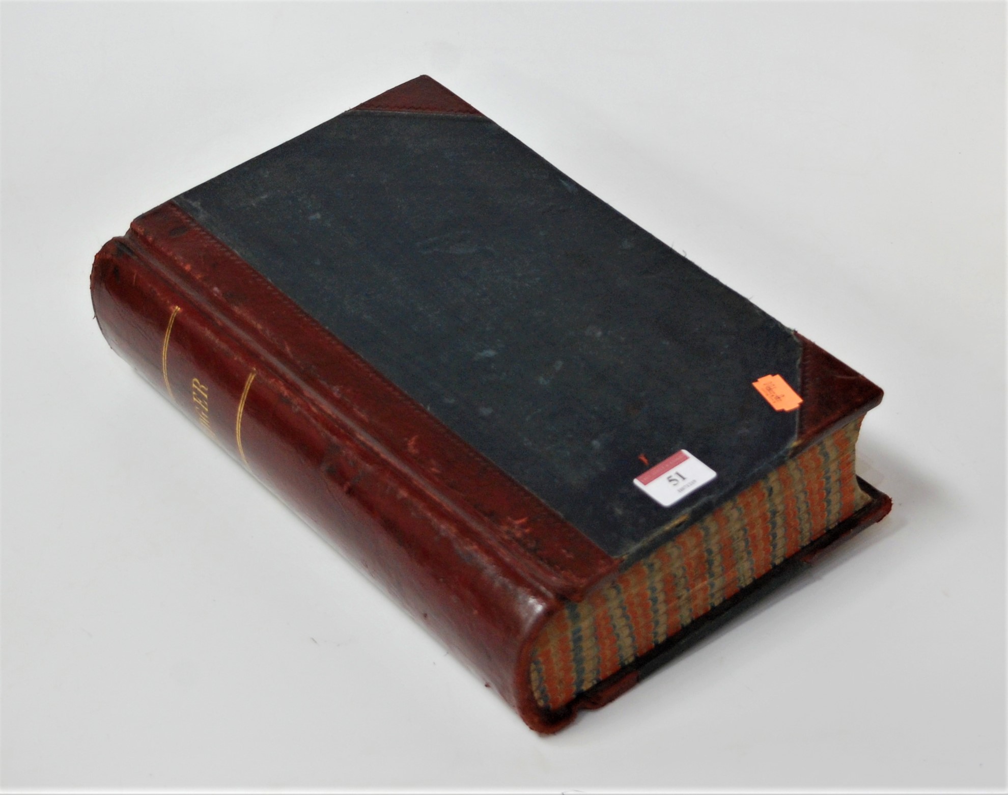 An early 20th century leather bound ledger