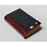 An early 20th century leather bound ledger