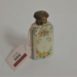 A Victorian glass scent bottle, hand-painted with C-scrolls and flowers, the gilt metal cover with