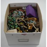A box of miscellaneous costume jewellery, to include faux pearl choker, various bead necklaces,