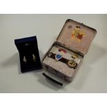A pair of Swarovski lady's facet cut earrings, boxed; together with a The Flintstones limited
