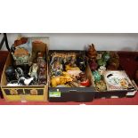 Three boxes of miscellaneous items to include storage jars and covers, various animal figures,