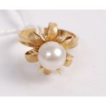 A contemporary 18ct gold and single cultured pearl set dress ring, 5.3g, size K