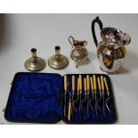 A silver plated hot water jug, together with a cream jug etc