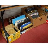 Three boxes containing various reference books, mainly relating to coins, antique porcelain and