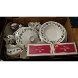 A Royal Doulton part tea and dinner service in the Burgundy pattern, together with boxed Royal