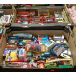 Two boxes containing a collection of various diecast model vehicles to include Dinky, Matchbox,