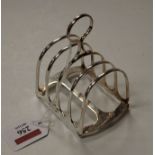 An Edwardian silver four division toast rack, maker James Dixon & Sons, Sheffield 1903, 3.3oz