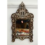 A 20th century eastern mother of pearl inlaid wall mirror with a bevelled plate, height 60cm,
