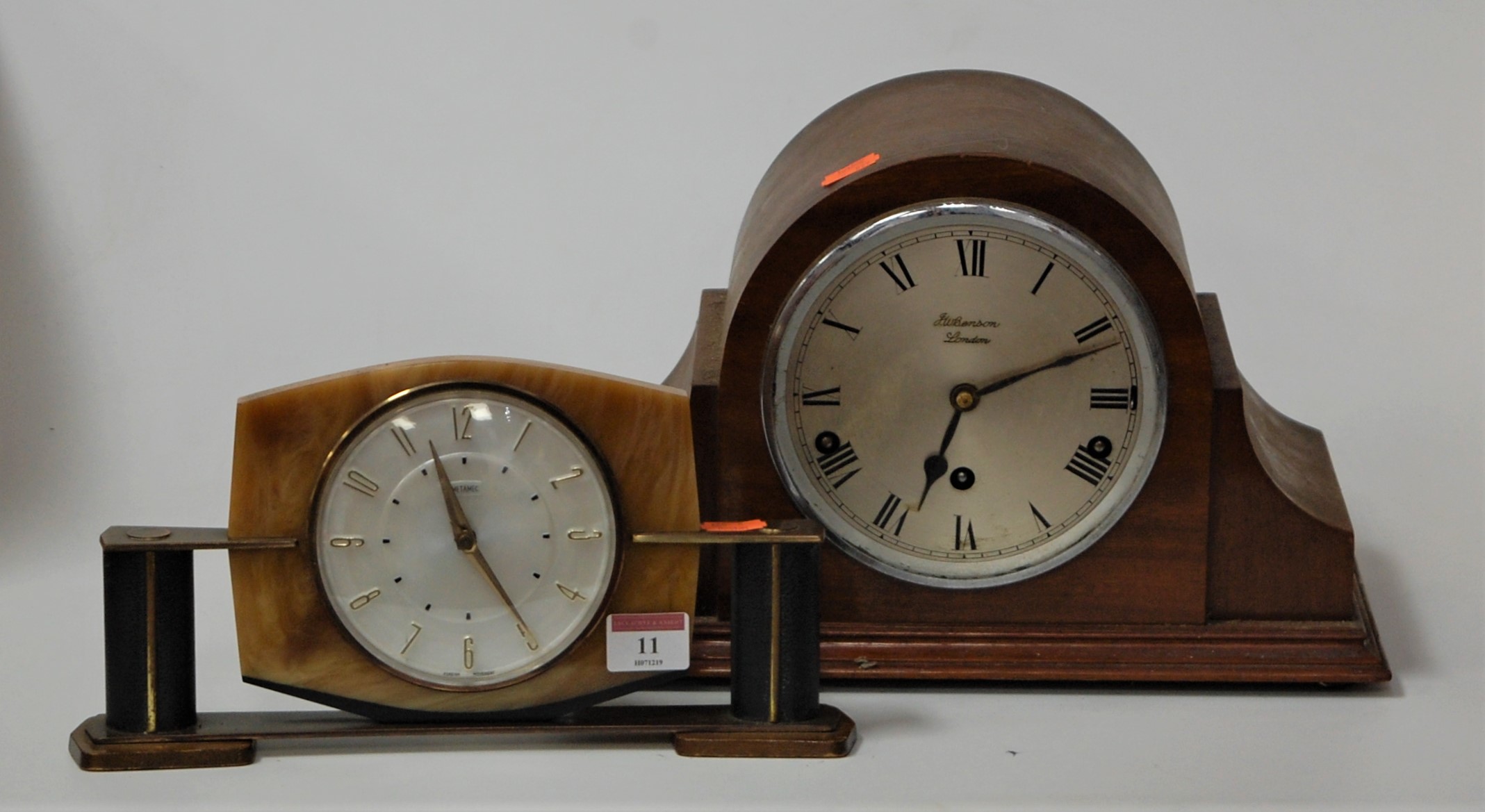 A 1920s mahogany cased mantel clock, the silvered dial with Arabic numerals signed JW Benson of