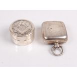 A silver sovereign case of square section with fine engine turned decoration together with Masonic