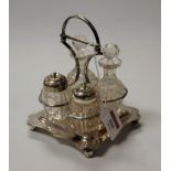 An Edwardian silver four bottle cruet, Sheffield, 1905