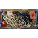 A box of miscellaneous costume jewellery, to include filigree work bangle, clip earrings, faux pearl
