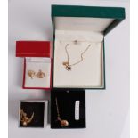 A pair of modern 9ct gold thistle ear studs; together with a 9ct gold small picture locket on