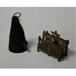 A novelty leather money box together with a brass letter rack (2)